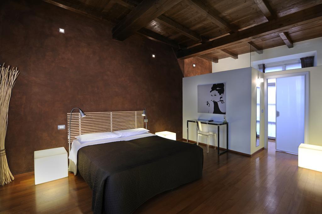 B&B Terres D'Aventure Suites Τορίνο Δωμάτιο φωτογραφία